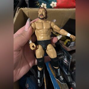 WWE action figure featuring the "Million Dollar Man" Ted DiBiase